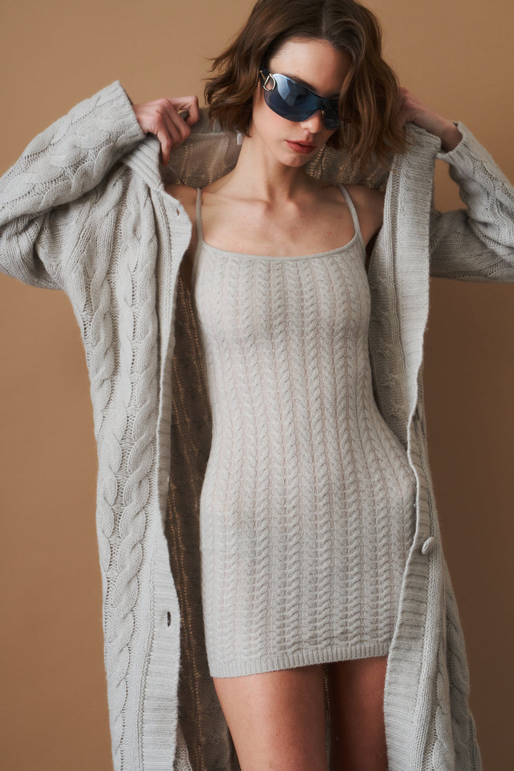 Women's light grey long cable knit cardigan with buttons and wide collar