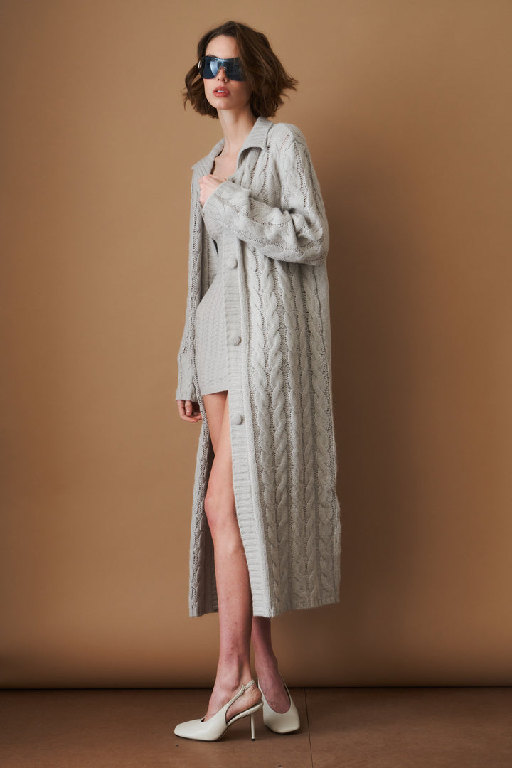 Women's light grey long cable knit cardigan with buttons and wide collar