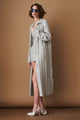 Women's light grey long cable knit cardigan with buttons and wide collar