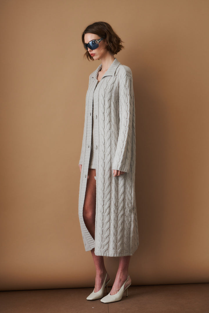 Women's light grey long cable knit cardigan with buttons and wide collar