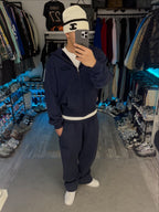Navy zip-up hoodie with hood, long sleeves and front pouch pockets