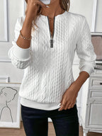 Women's cable knit half-zip sweater with long sleeves