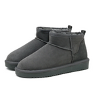 Women's mini ankle boots with round toes and textured soles