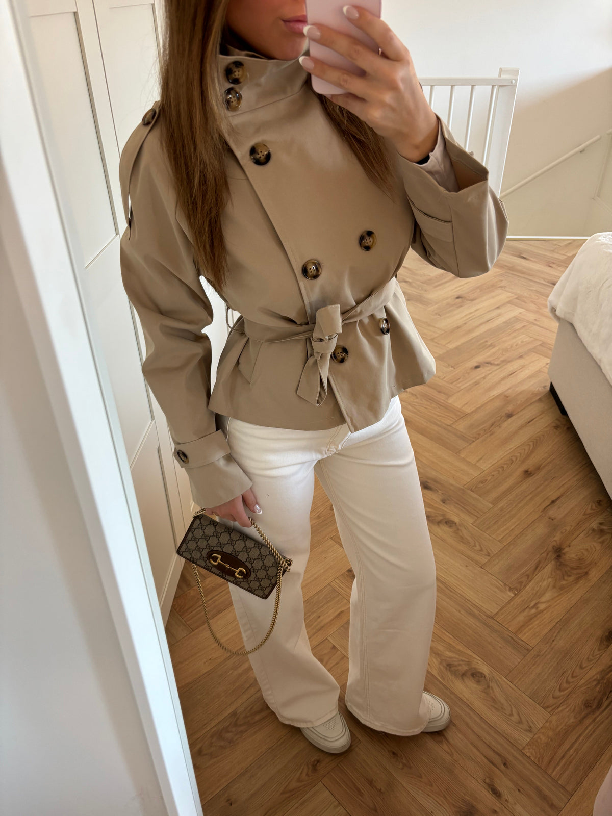 Women's beige cropped trench coat with high collar and waist belt