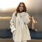 Women's textured open front longline cardigan with long sleeves and patch pockets