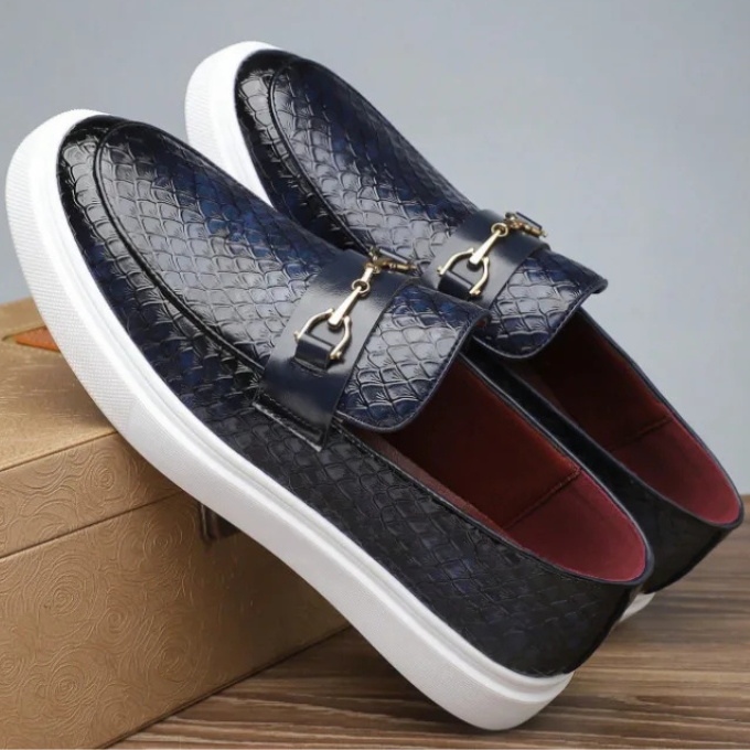 Embossed slip-on loafers with gold bit detail and flat contrasting soles