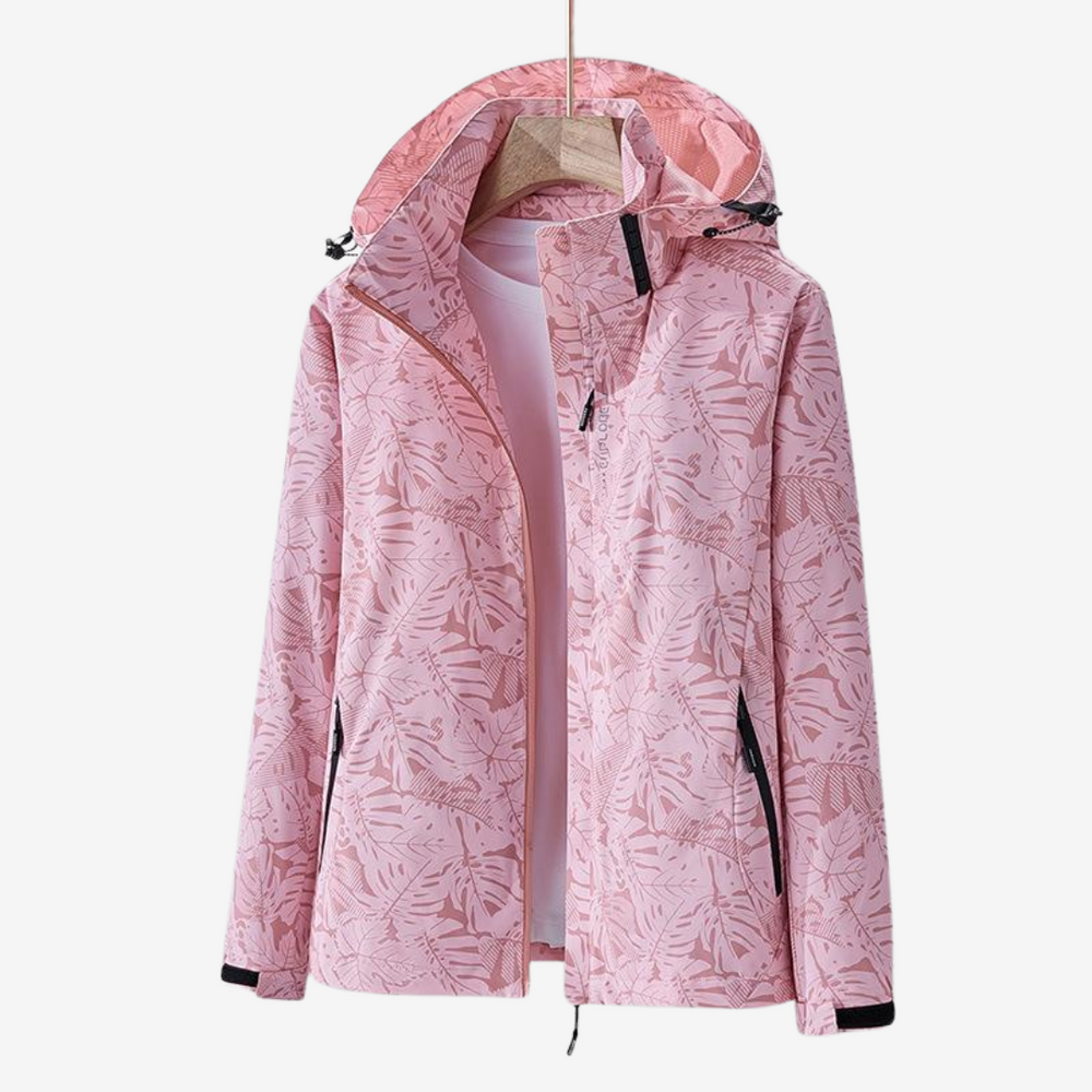 Women's hooded leaf print windbreaker jacket with long sleeves and zipped pockets