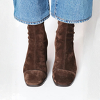 Women's brown ankle boots with square toes, ruched shafts and mid block heels