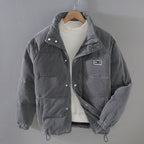 Men's ribbed corduroy padded jacket with high collar, zip fastening and multiple pockets