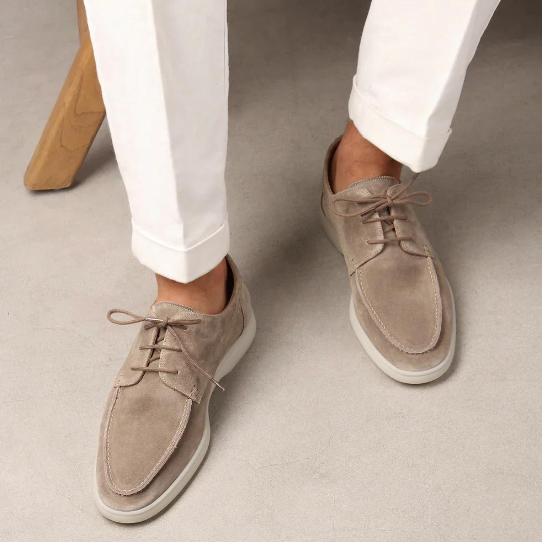 Men's lace-up moccasin shoes shown in black and beige with round toes and flat soles