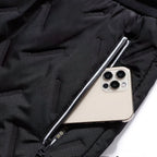 Women's quilted jogger trousers with drawstring waist, zipped pockets and ribbed ankle cuffs