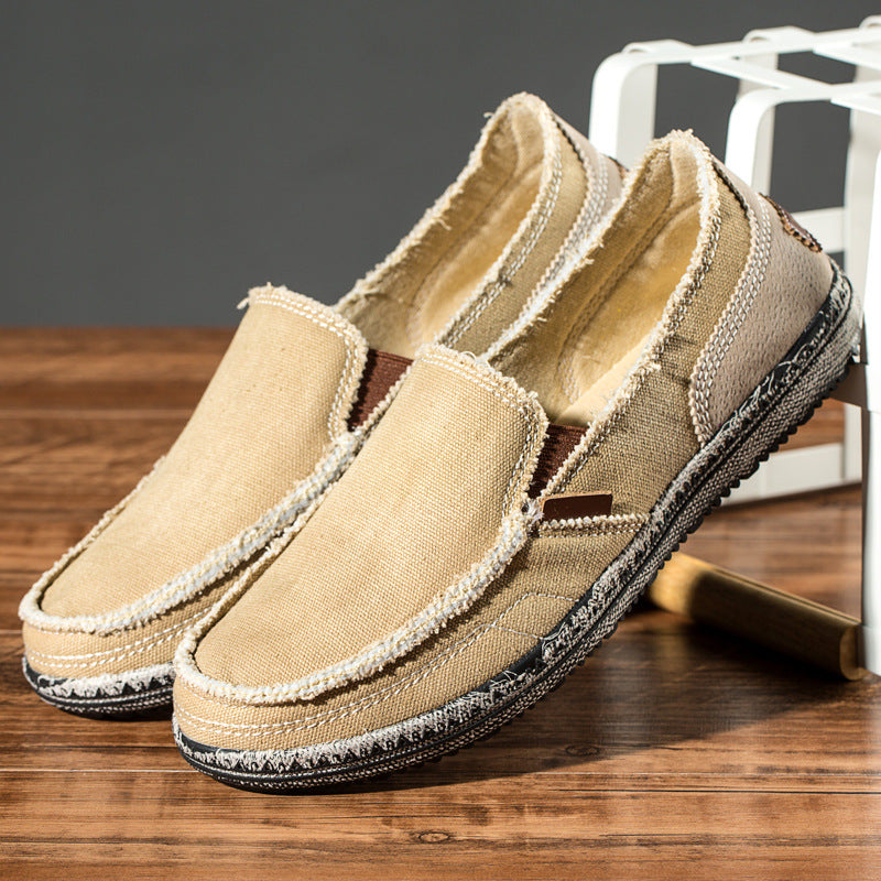 Unisex canvas loafer with moc toe, contrast stitching and flat sole
