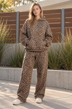 Women's leopard print hooded sweatshirt and matching full-length trousers set