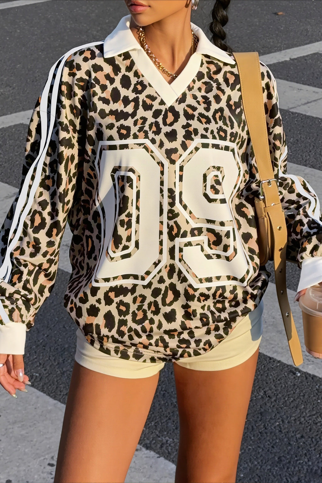 Women's leopard print sweatshirt with collared V-neck and number graphic