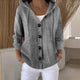 Women's hooded knitted cardigan with long sleeves, buttons and ribbed trims
