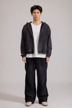 Men's black zip-up hoodie jacket with front pockets and vintage finish