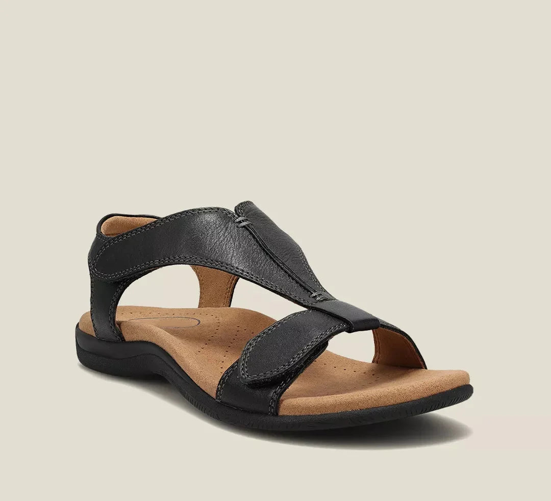 Women's black orthopedic t-strap sandal with adjustable velcro and contoured footbed