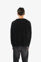 Men's black plain knit sweater with crew neck and ribbed trims