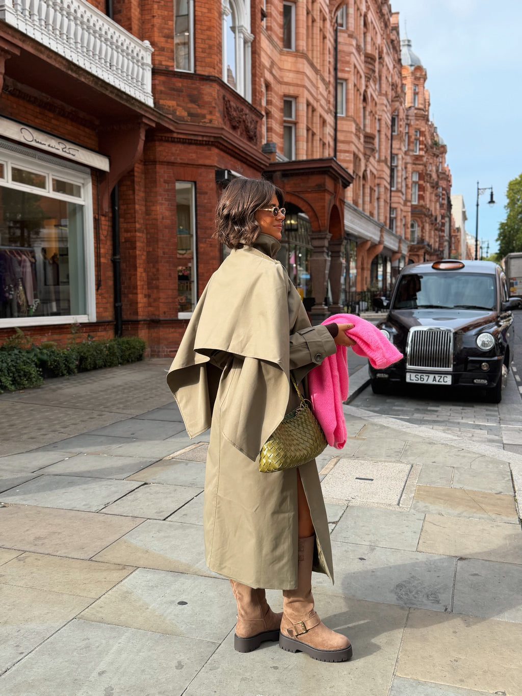 Women's beige belted trench coat with cape overlay and long sleeves