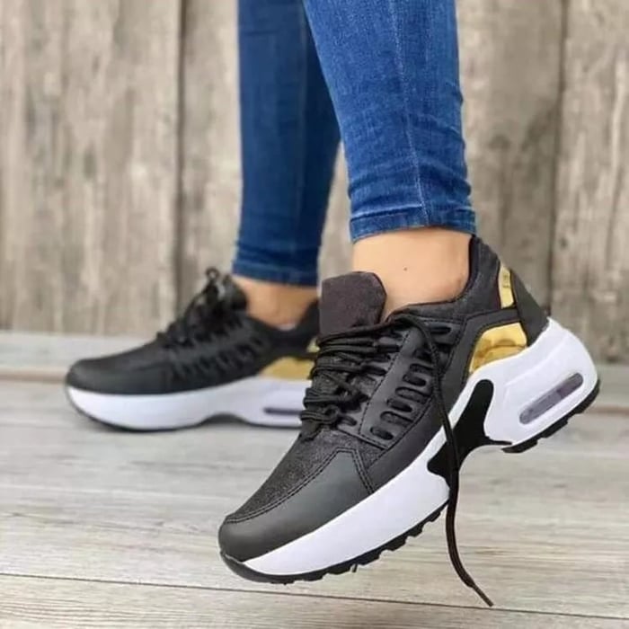 Women's lace-up sneakers with panelled uppers and platform soles