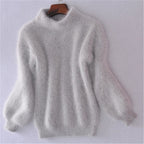 Women's fluffy turtleneck sweater with long sleeves and ribbed trims