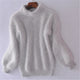 Women's fluffy turtleneck sweater with long sleeves and ribbed trims