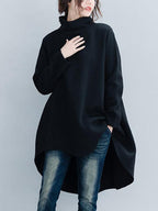 Women's loose turtleneck sweatshirt with long sleeves and a hi-low hem