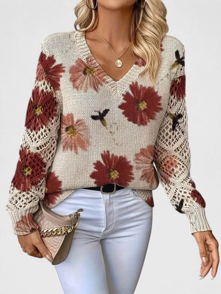 Women's floral V-neck sweater with long sleeves and open-knit sleeve panels