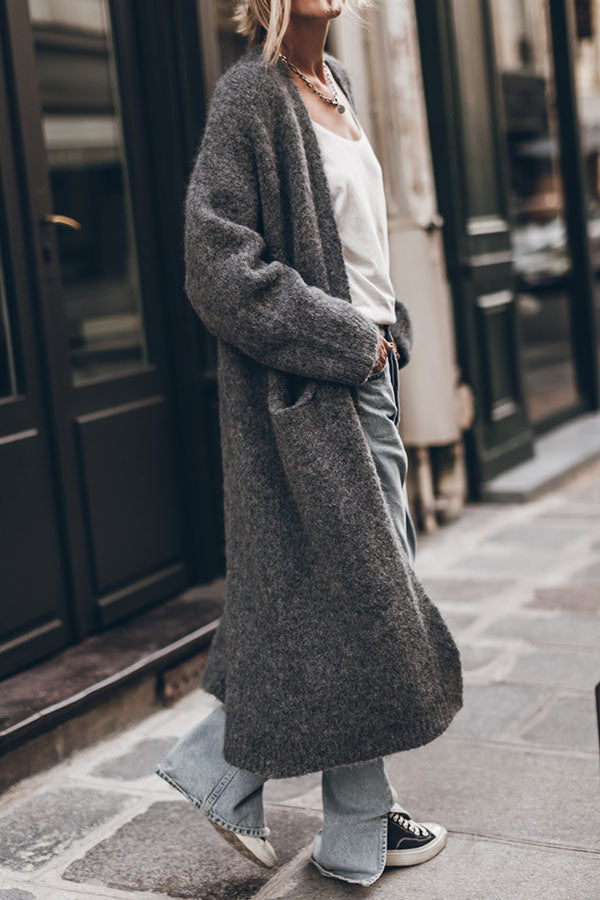 Women's oversized open front knit midi cardigan with long sleeves and front pockets