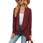 Women's open front textured cable cardigan with long sleeves and draped front panels