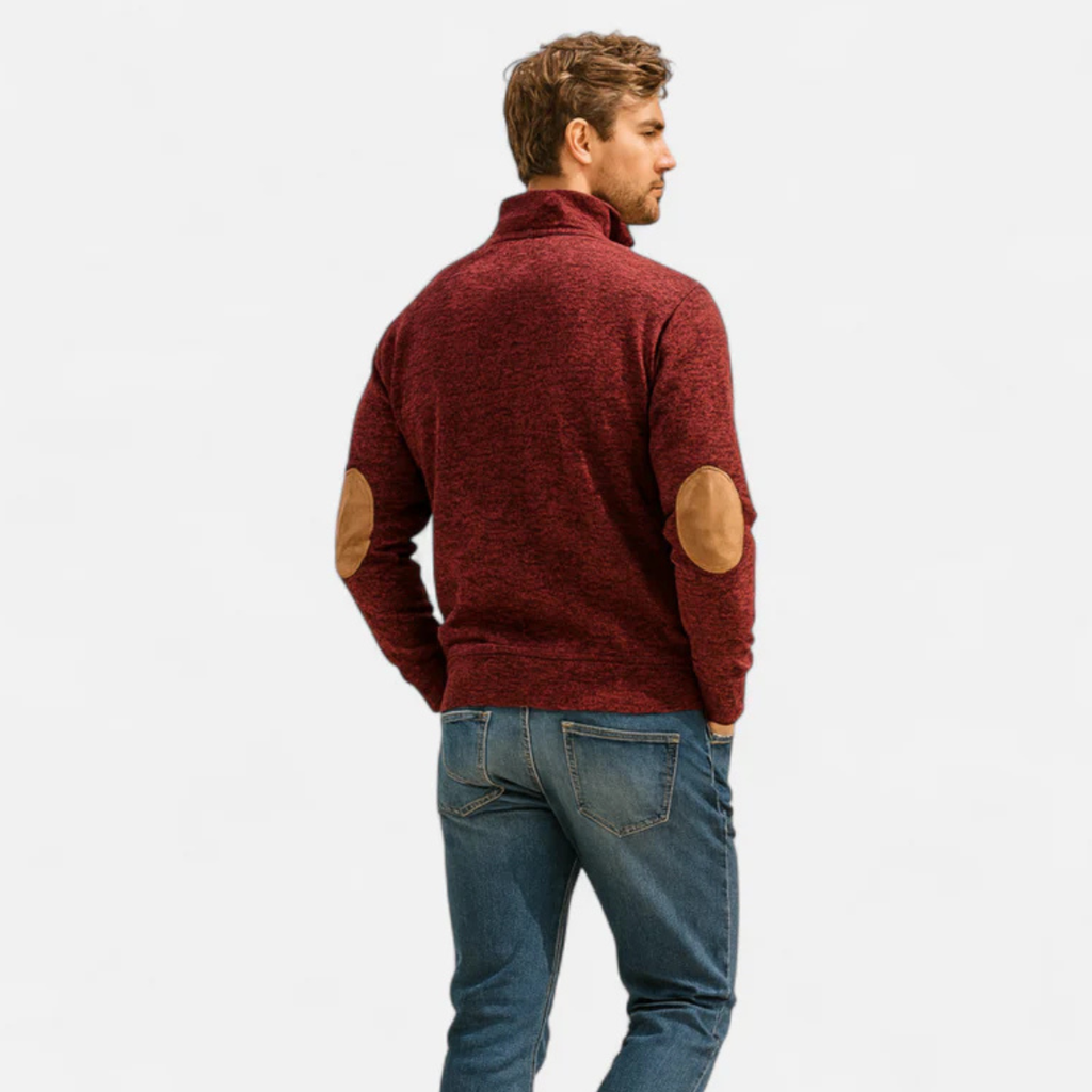 Men's textured knit sweater with mock neck and contrast elbow patches