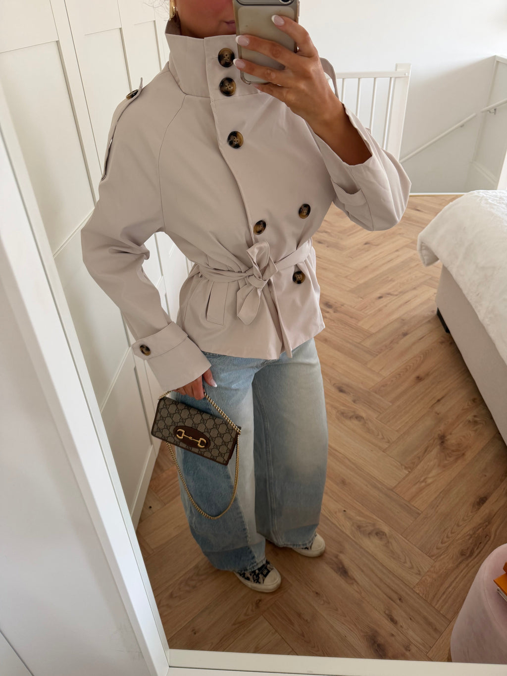 Women's beige cropped trench jacket with stand collar and tie belt