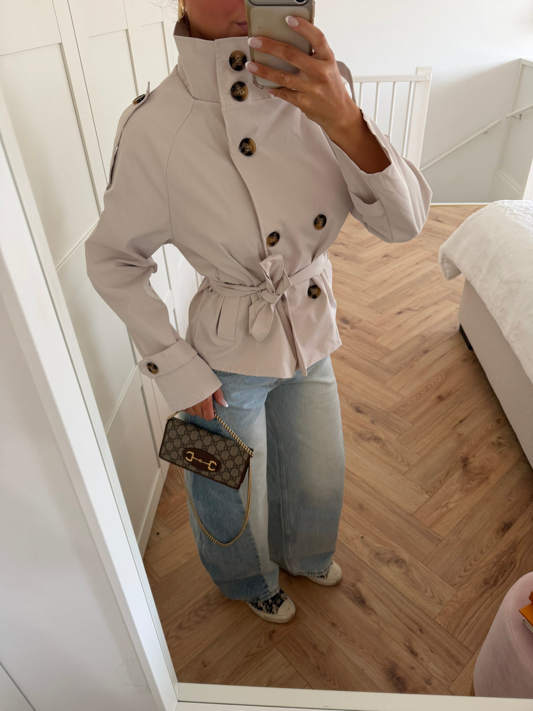 Women's beige cropped trench jacket with stand collar and tie belt