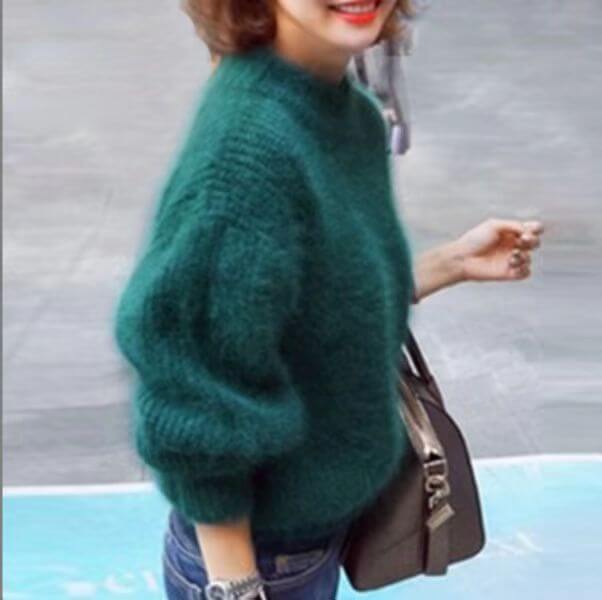 Women's fluffy turtleneck sweater with long sleeves and ribbed trims