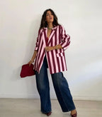 Women's striped blazer with notched lapels, button fastening and flap pockets