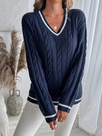 Women's navy cable knit V-neck sweater with contrast striped trims
