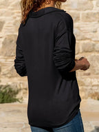 Women's long-sleeve collared jumper with a half-zip front