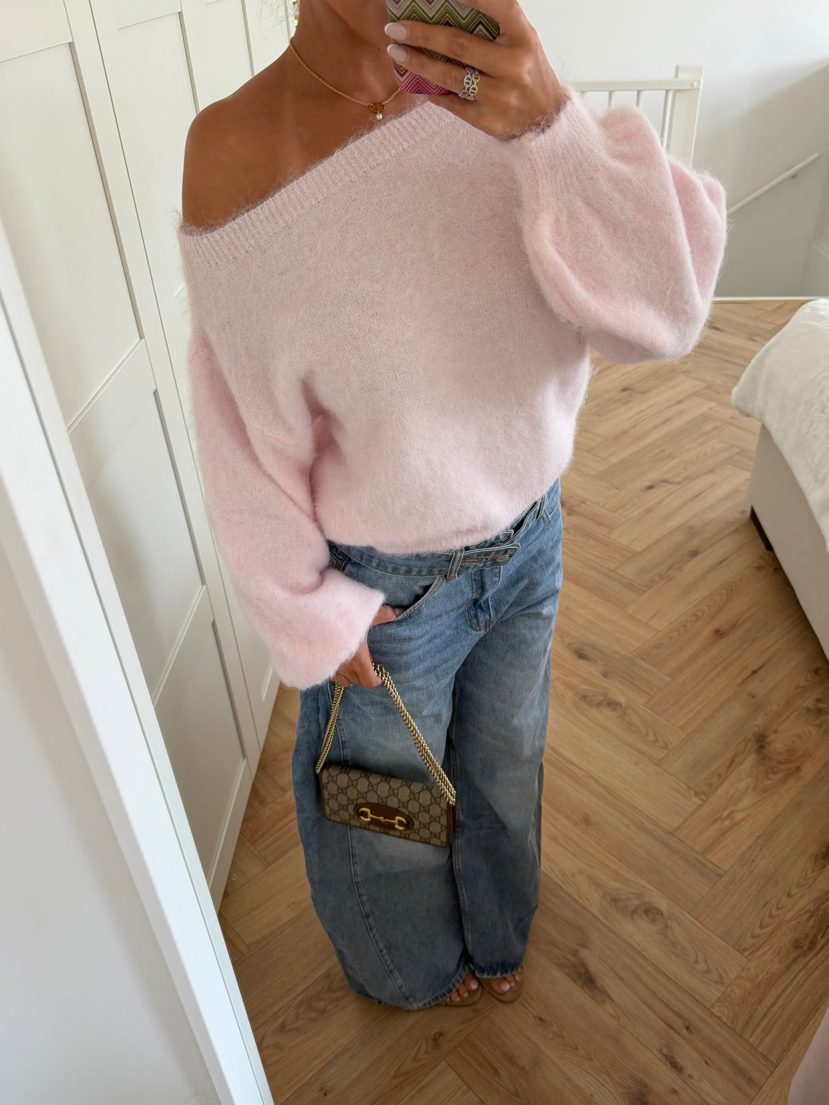 Pink fuzzy off-shoulder jumper with long balloon sleeves and ribbed trims