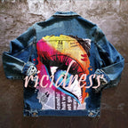 Women's denim jacket with colourful graphic eye print on the back