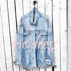 Graphic denim jacket with colourful Halloween-style artwork on the back