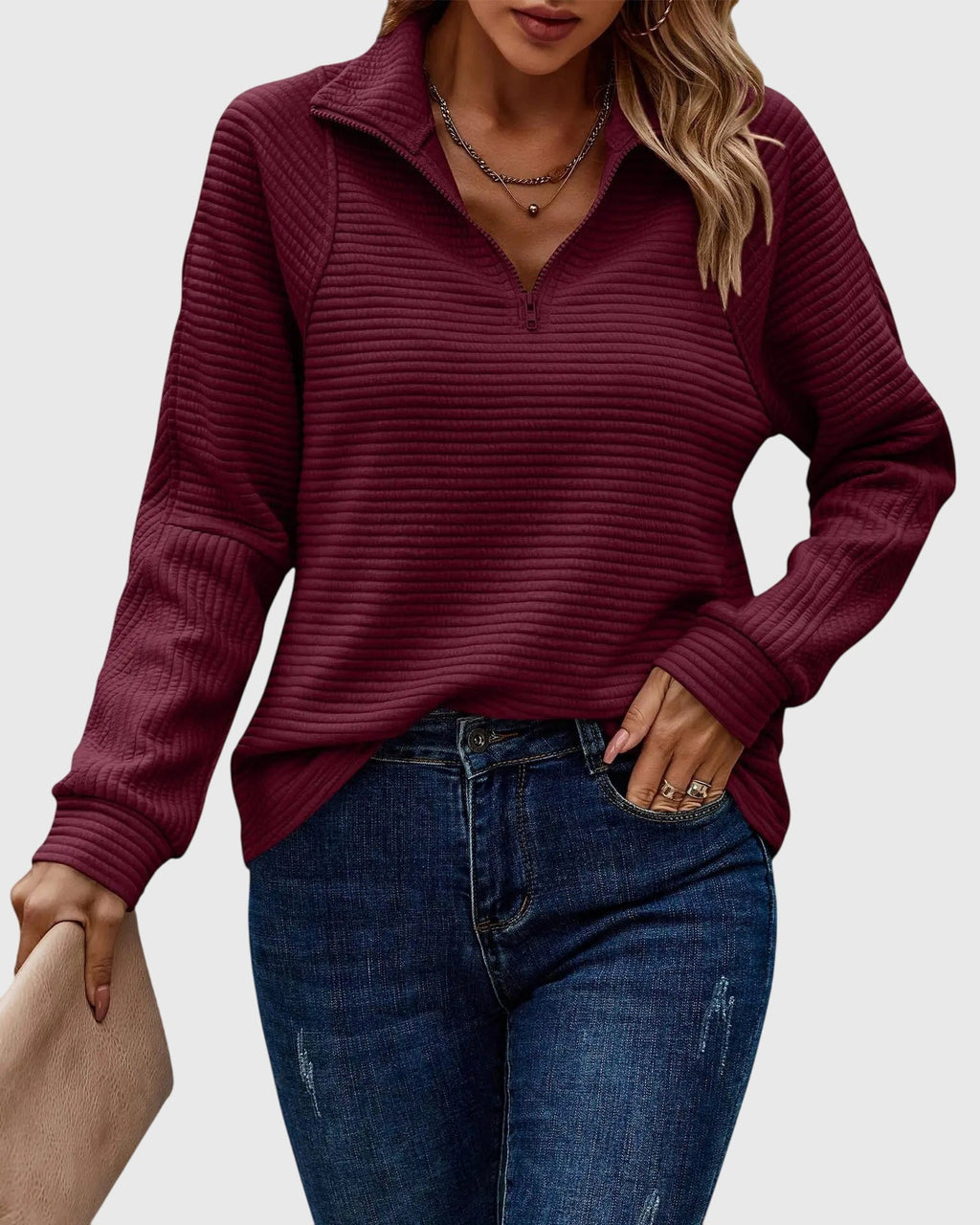 Women's ribbed quarter-zip sweater with collar and long sleeves