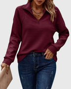 Women's ribbed quarter-zip sweater with collar and long sleeves