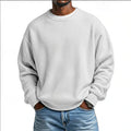 Men's relaxed textured crew neck sweatshirt with long sleeves and ribbed trims