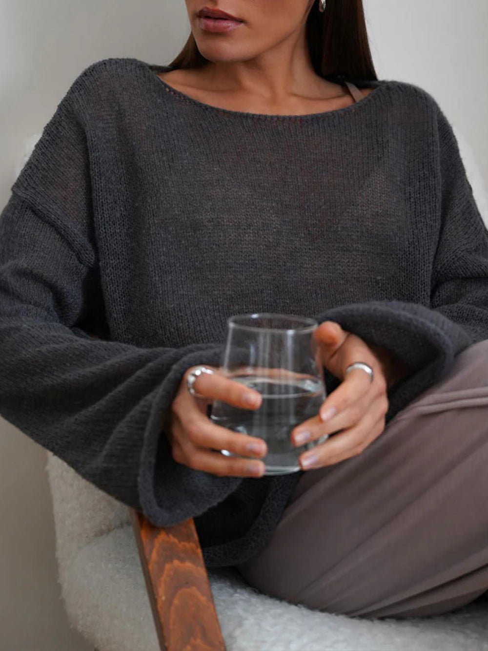 Women's open-knit oversized sweater with wide sleeves and crew neck