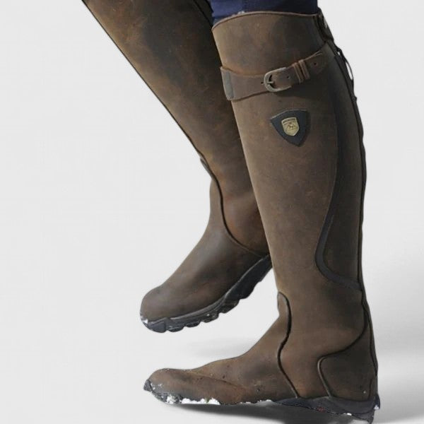 Tall winter boots with buckle straps and low heels