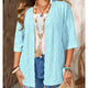 Women's open front textured cardigan with three-quarter sleeves