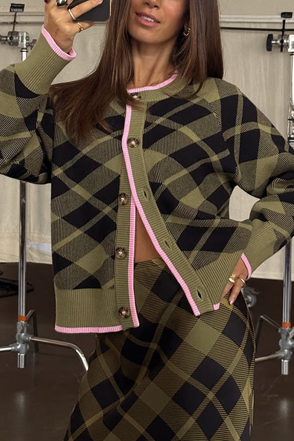 Women's green plaid cardigan with pink trim and buttons