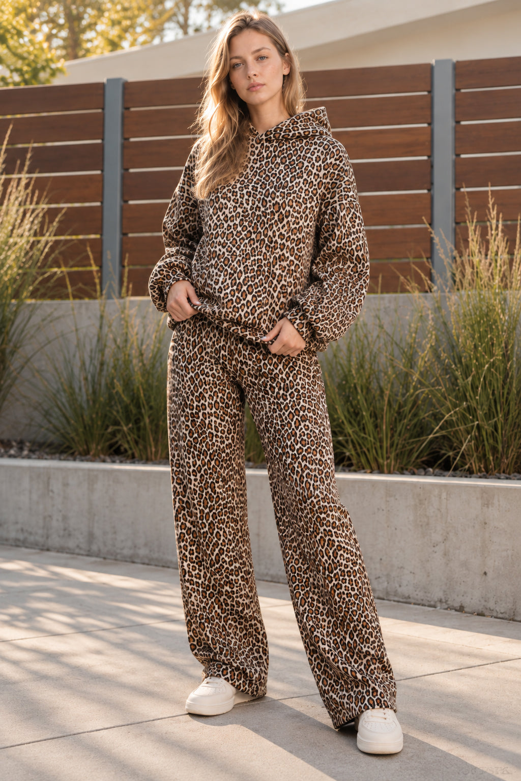 Women's leopard print hooded sweatshirt and matching full-length trousers set