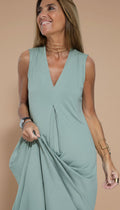 Women's sleeveless V-neck maxi dress with centre pleats and flowing floor-length skirt