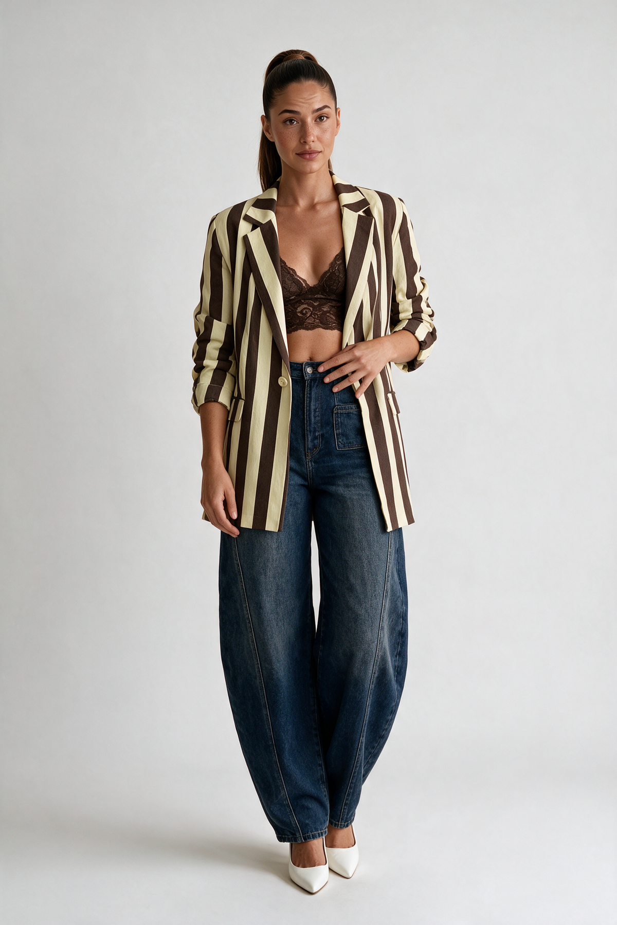 Women's striped blazer with notched lapels, button fastening and flap pockets